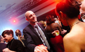 Corporate event photo with dancers